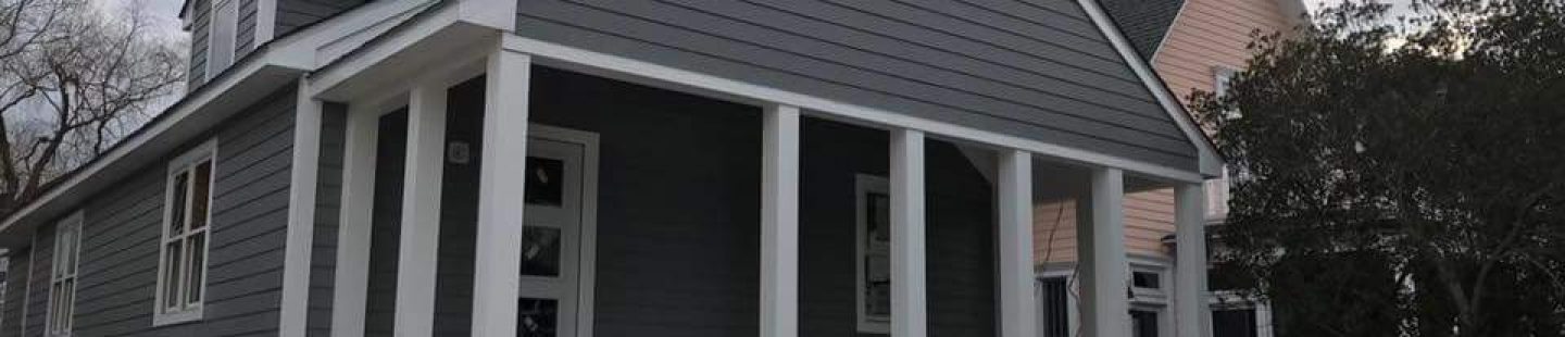 condo with completed gray superior vinyl siding