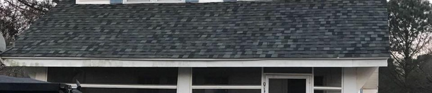completed black asphalt roofing