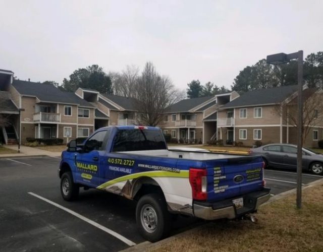 shot of finished roof replacement on an apartment complex